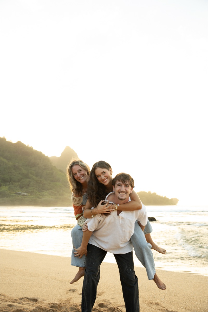 Family laughing on a Hawaii beach